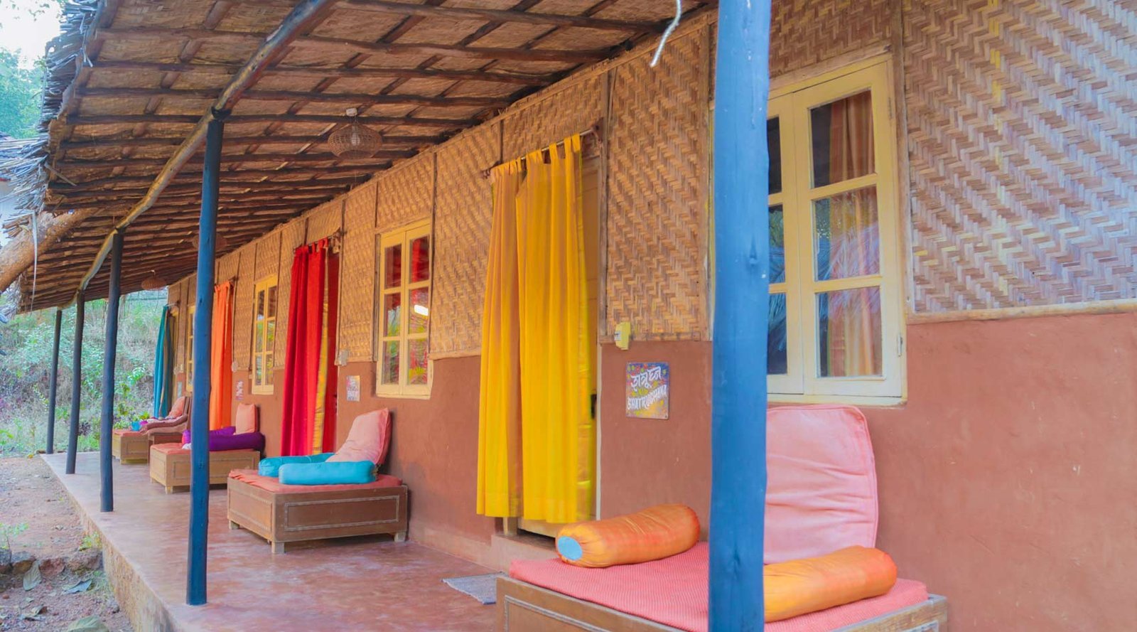 The covered veranda outside SWAN’s natural cottages